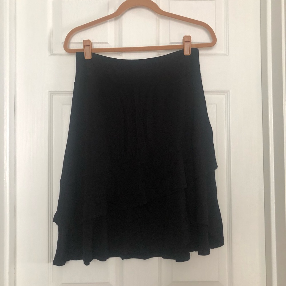 Studio West black flounce skirt in M. Never worn.